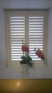 Shutters with sun coming through